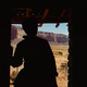 Martha Edwards inside the symbol of civilization, staring out at the wild wastes.